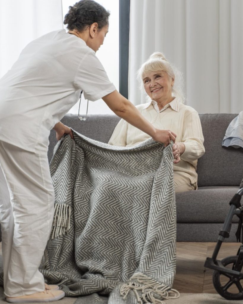 doctor-taking-care-senior-woman-home (Large)