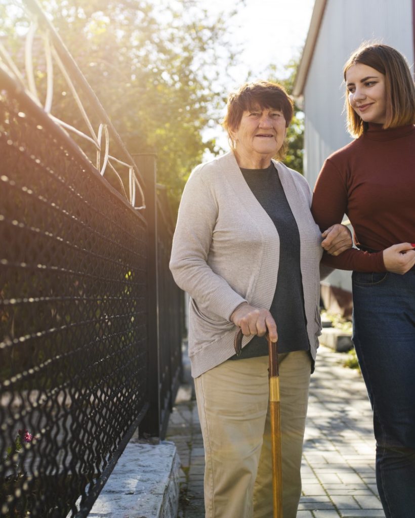person-helping-their-elder-neighbour (Large)